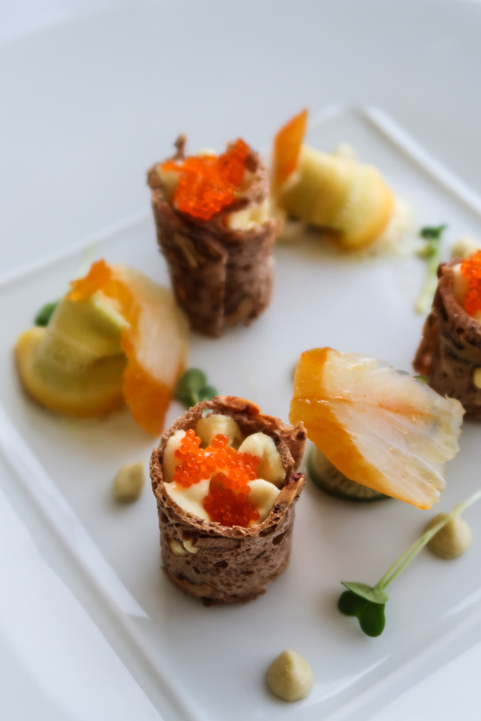 Entrée de poisson et crustacés au restaurant Tour des Vents